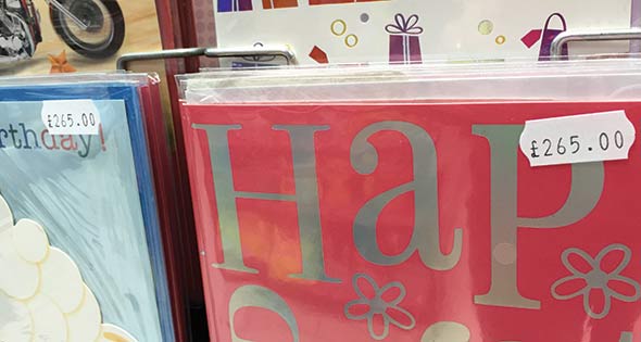 Greetings card with price sticker showing '£265.00'