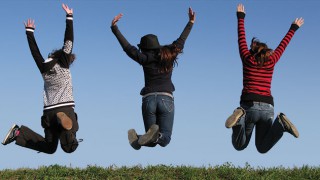 Girls jumping in the air