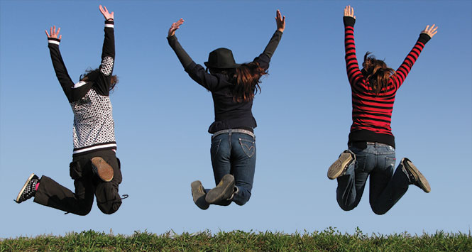 Girls jumping in the air