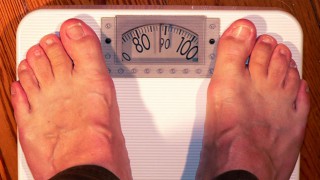 Standing on scales