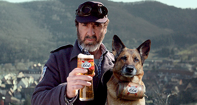 Eric Cantona, a pint of Kronenbourg and a large dog