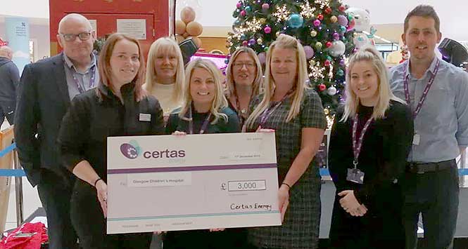Certas staff with large cheque