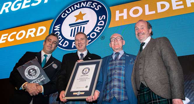 Guinness World Records Adjudicator Jack Brockbank, Scotmid Chief Executive John Brodie, Scotmid President Harry Cairney and Fred McAulay.