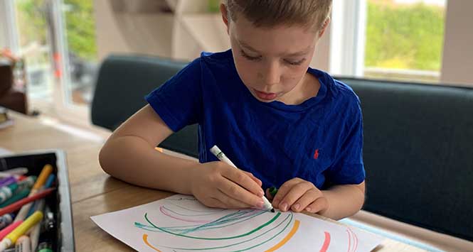 child drawing picture