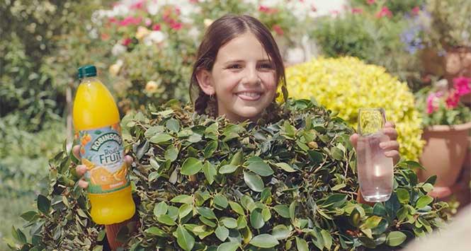 Child in hedge
