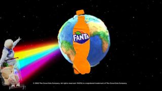 Fanta bottle projecting a rainbow