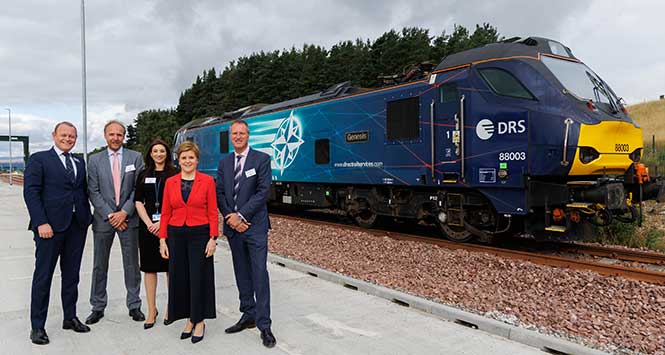 Nicola Sturgeon beside a locomotive