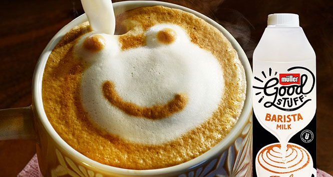 Monkey face drawn in coffee foam