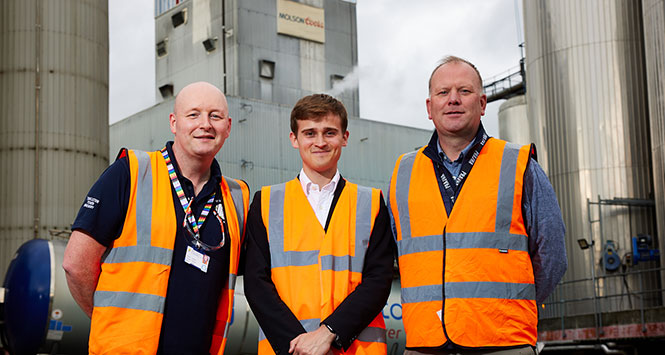 Three men in hi-vis jackets