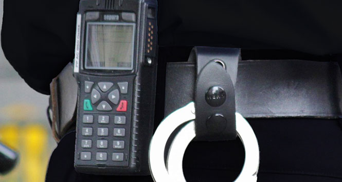 Police officer's radio and handcuffs
